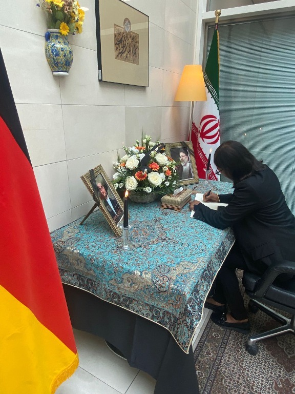 Ambassador Shaan signs the Book of Condolences at the Embassy of Iran